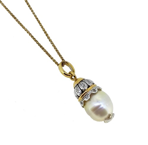 Lot 205 - A pearl and diamond pendant and chain