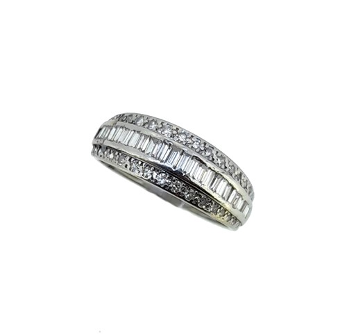 Lot 80 - A three row diamond half hoop ring