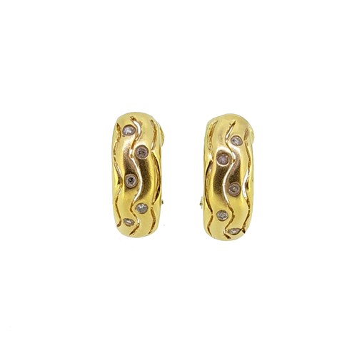 Lot 86 - A pair of diamond set ear clips
