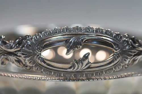 Lot 626 - An Edward VII silver swing handled bread basket
