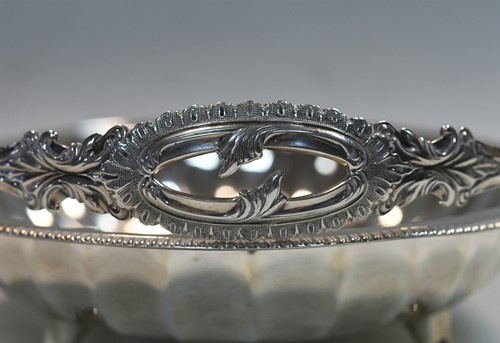 Lot 626 - An Edward VII silver swing handled bread basket