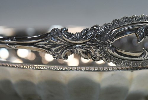 Lot 626 - An Edward VII silver swing handled bread basket