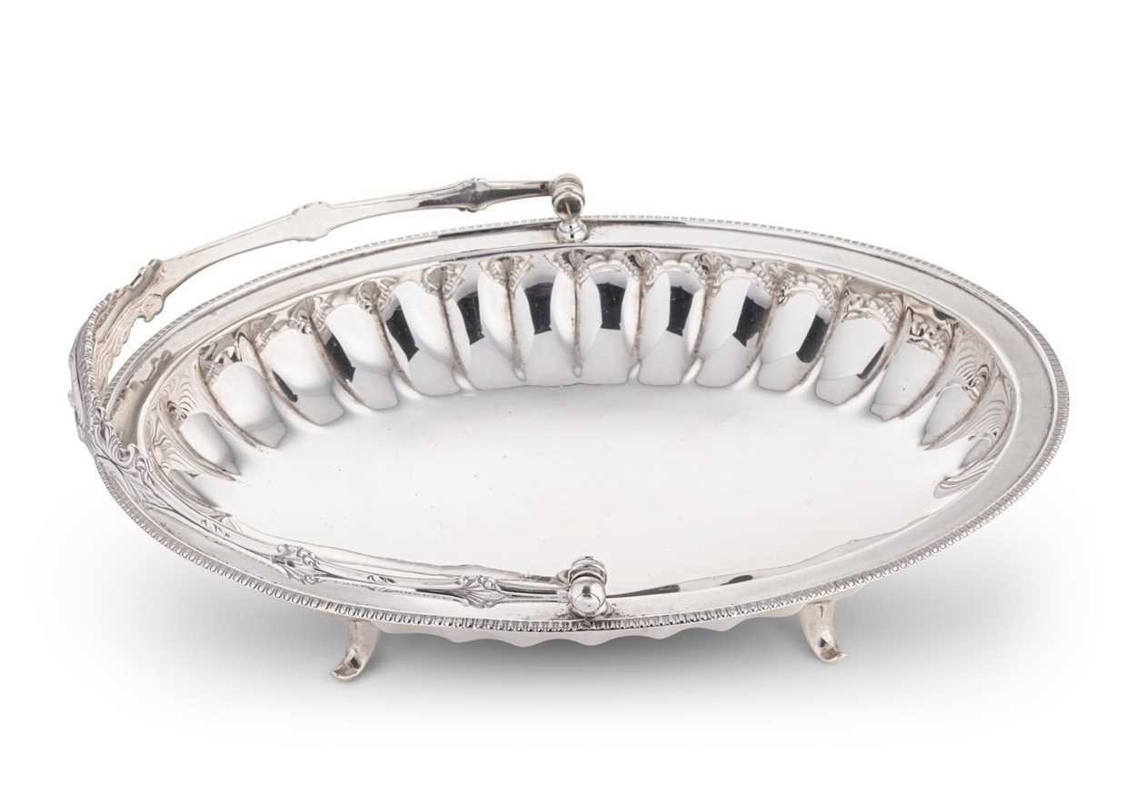 Lot 626 - An Edward VII silver swing handled bread basket
