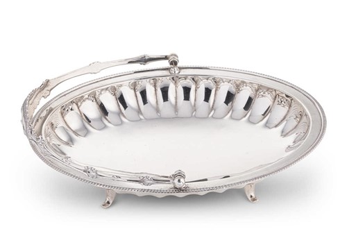 Lot 626 - An Edward VII silver swing handled bread basket