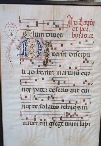 Lot 327 - A large vellum manuscript leaf of music and...