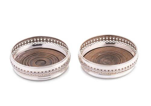 Lot 671 - A pair of late 20th century silver bottle coasters
