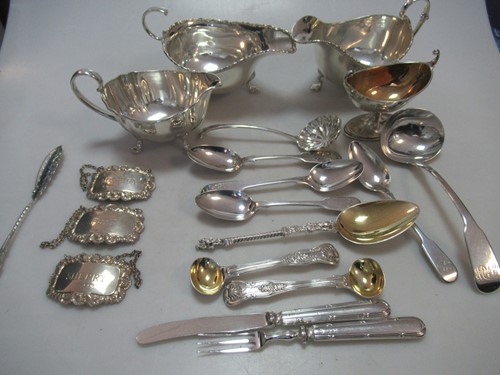 Lot 231 - A collection of silver flatware, mainly spoons,...