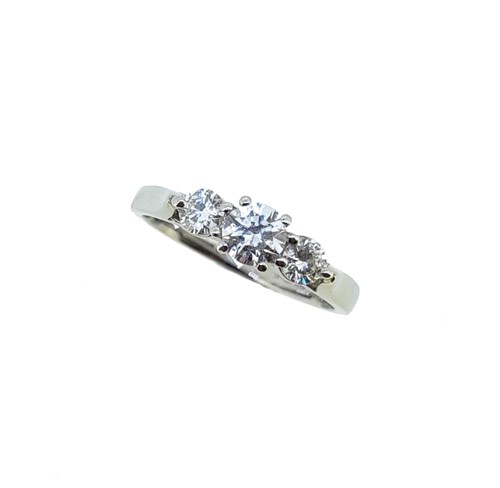 Lot 81 - A platinum three stone diamond ring