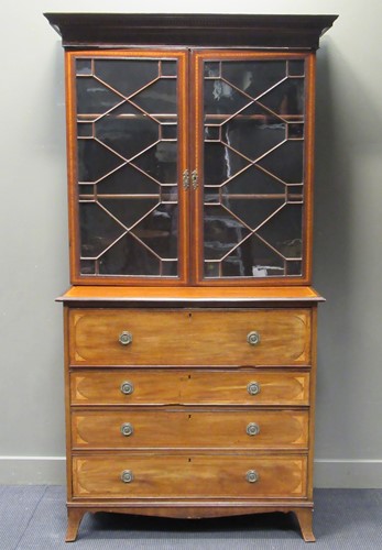 Lot 457 - A mahogany and inlaid secretaire bookcase