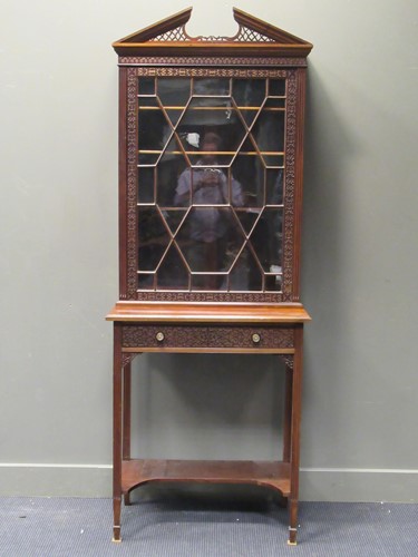 Lot 327 - A George III style mahogany blind fret display...