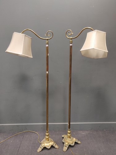 Lot 388 - A pair of brass standard lamps, early 20th...
