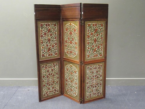 Lot 428 - An Indian floral panel decorated folding...