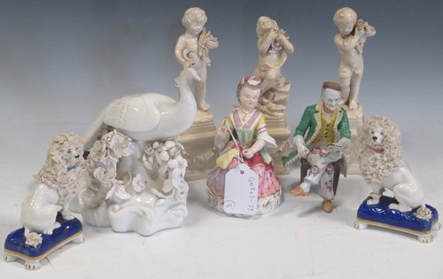 Lot 20 - A pair of damaged German porcelain seated...