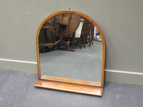 Lot 443 - A large hall mantle mirror of arched form with...