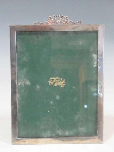 Lot 214 - A Victorian silver easel photograph frame