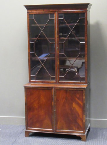 Lot 407 - A 20th century mahogany glazed bookcase, 198 x...