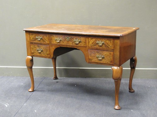 Lot 429 - A walnut revival dressing table, the...