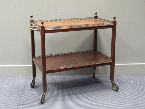 Lot 506 - A mahogany two tier trolley with brass gallery...