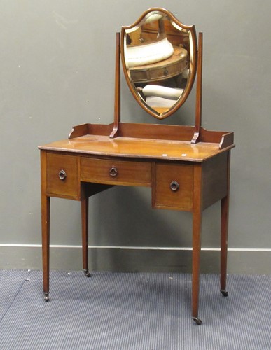 Lot 414 - An Edwardian mahogany dressing table, the...