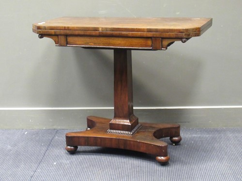 Lot 505 - A late Regency rosewood foldover card table,...