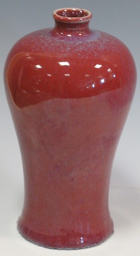Lot 33 - A flambe red vase with blue speckling, 19.5cm...