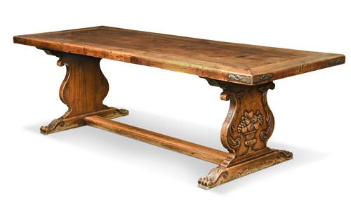 Lot 154 - An Italian Renaissance style walnut trestle table