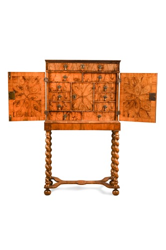 Lot 170 - An olive wood oyster veneered cabinet, 17th century on later stand