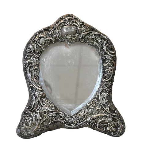 Lot 617 - An Edward VII silver framed dressing table mirror