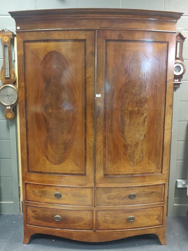 Lot 501 - An Edwardian mahogany bow front double...