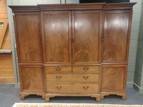 Lot 465 - A 19th century breakfront mahogany wardrobe,...