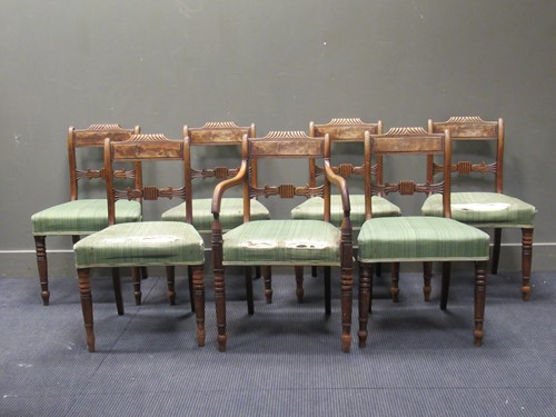 Lot 441 - A set of seven William IV mahogany bar back...