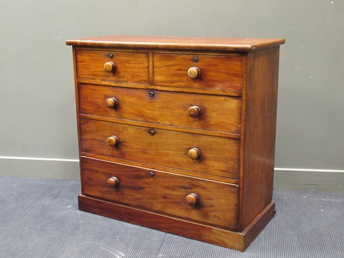 Lot 421 - A late 19th century mahogany chest of two...