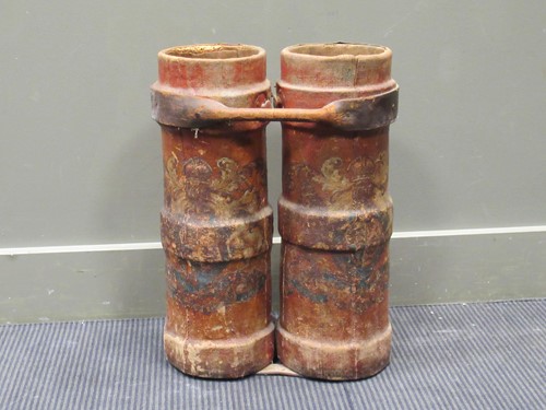 Lot 176 - Two 20th century red painted cordite canisters...