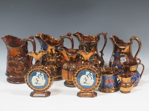 Lot 18 - A collection of lustre to include jugs, cans...