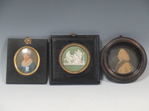 Lot 148 - A 19th century green jasperware circular...