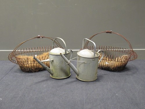 Lot 592 - A galvanised watering can by S.W. Bullas &...