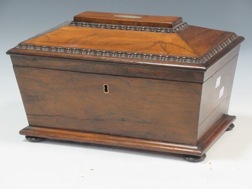 Lot 125 - A Regency rosewood sarcophagus shaped tea...