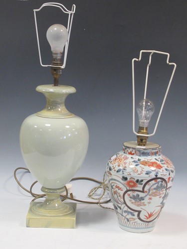 Lot 27 - A green glazed ceramic balluster lamp together...