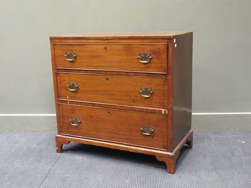 Lot 462 - A 19th century mahogany chest of three long...
