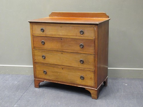 Lot 439 - An Edwardian mahogany chest of drawers, the...