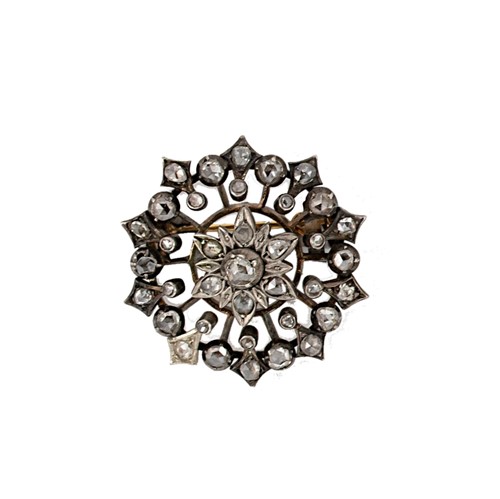 Lot 94 - A Victorian diamond set circular brooch