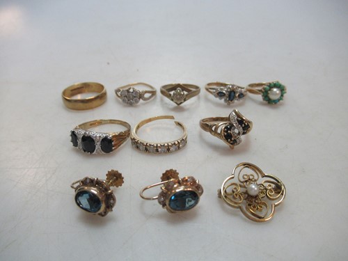 Lot 235 - A collection of eight 9ct gold rings, together...