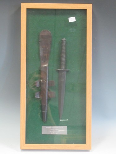 Lot 144 - A framed Fairbairn Sykes Commando dagger, 53 x...