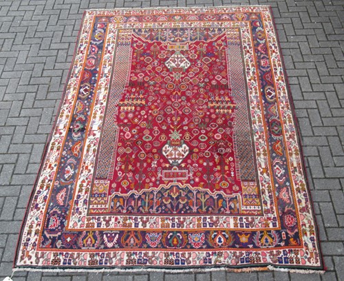 Lot 608 - A Qashqai carpet with intricate design in...