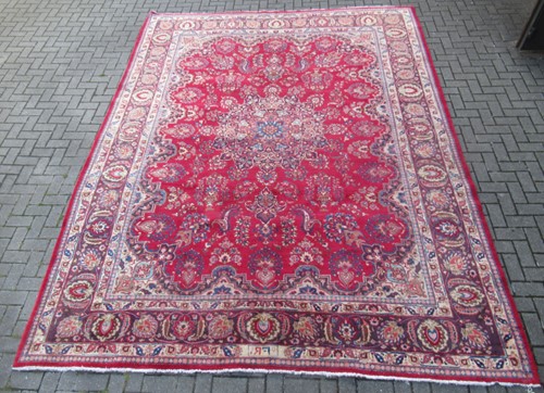 Lot 600 - A Qashqai carpet of typical design with a warm...
