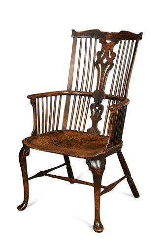 Lot 109 - A Thames Valley cherry, walnut and elm comb-back armchair, circa 1775