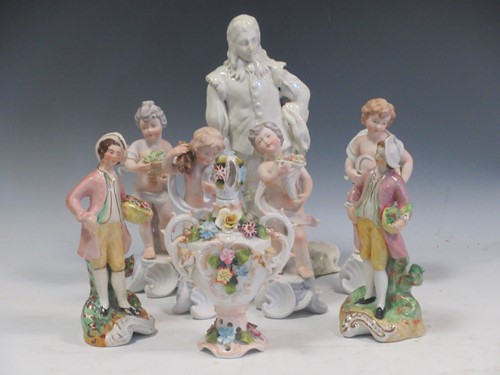 Lot 13 - A set of four Portugese ceramic figures...