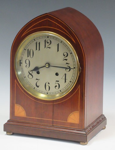 Lot 132 - An Edwardian inlaid mahogany mantel clock of...