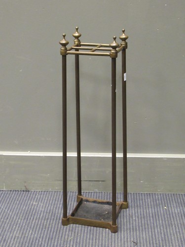 Lot 545 - A four division brass stick stand, 61 x 18 x 18cm