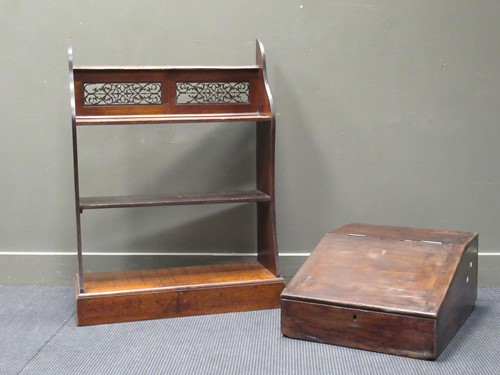 Lot 523 - A mahogany floor standing open bookcase with...